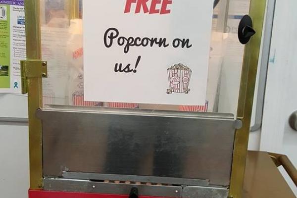 Popcorn Stand that's offering free popcorn
