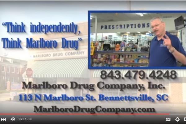 A screenshot from a commercial that is promoting Marlboro Drug Company by stating, "Think independently, Think Marlboro Drug".